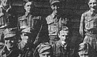 Group photo of members from the Royal West Kent Regiment who were prisoners of war in 1941 including Lance Corporal Eric Arthur Eagles