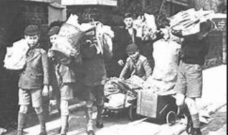 Boys collecting paper salvage during world war two